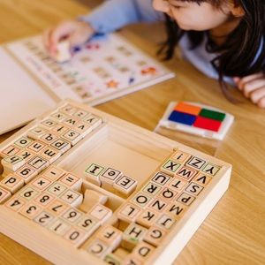 Kids Wooden ABCs & 123s stamp set with 25-page stamp-and-learn activity book